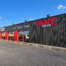 Vue générale de la façade et des enseignes SXT Moto 22
